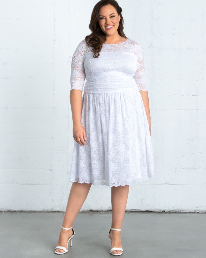 Front of a model wearing a size 0X Aurora Lace Dress in WHITE by Kiyonna. | dia_product_style_image_id:227590